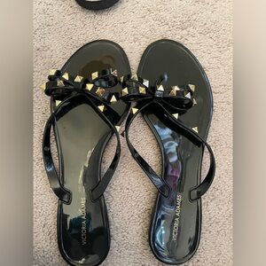 Victoria Adames bow with grommet sandals